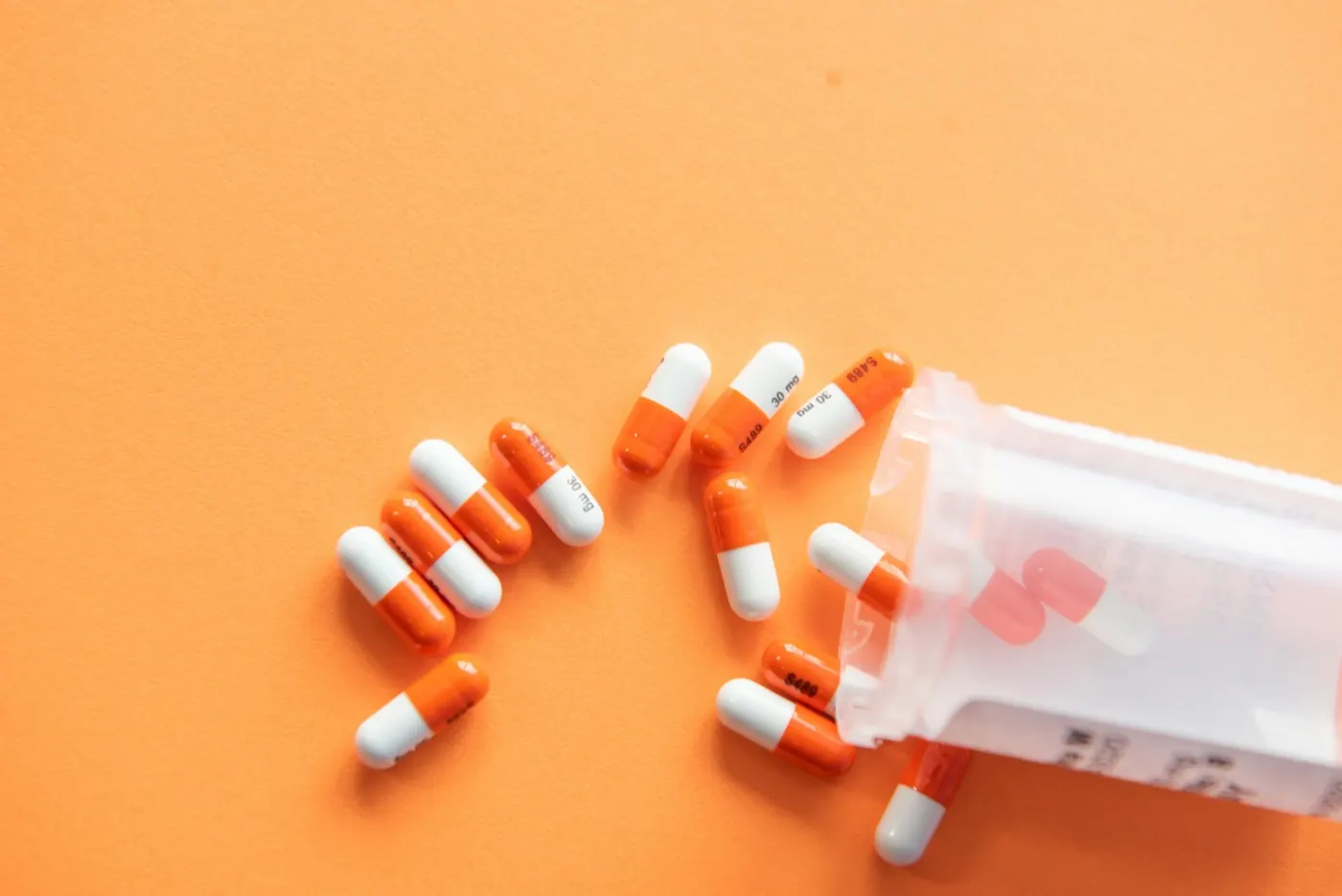 Pharmacist arranging medication on shelves